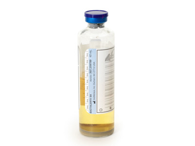 Flaska för bakterielösning med lock.